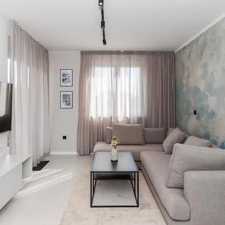 Luxury By Belmont Realty *