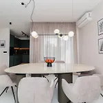 Luxury By Belmont Realty
