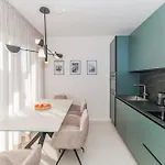 Luxury By Belmont Realty *