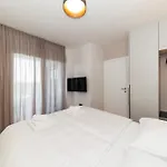 Luxury By Belmont Realty