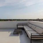 Luxury By Belmont Realty *