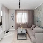 Luxury By Belmont Realty *