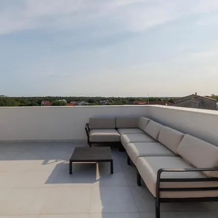 Luxury By Belmont Realty *