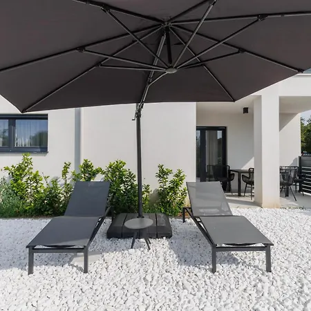 Luxury By Belmont Realty